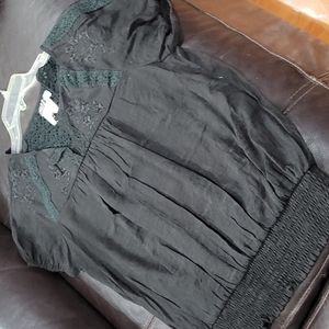 AMP beautiful Black and looks like a dark hunter green  size L